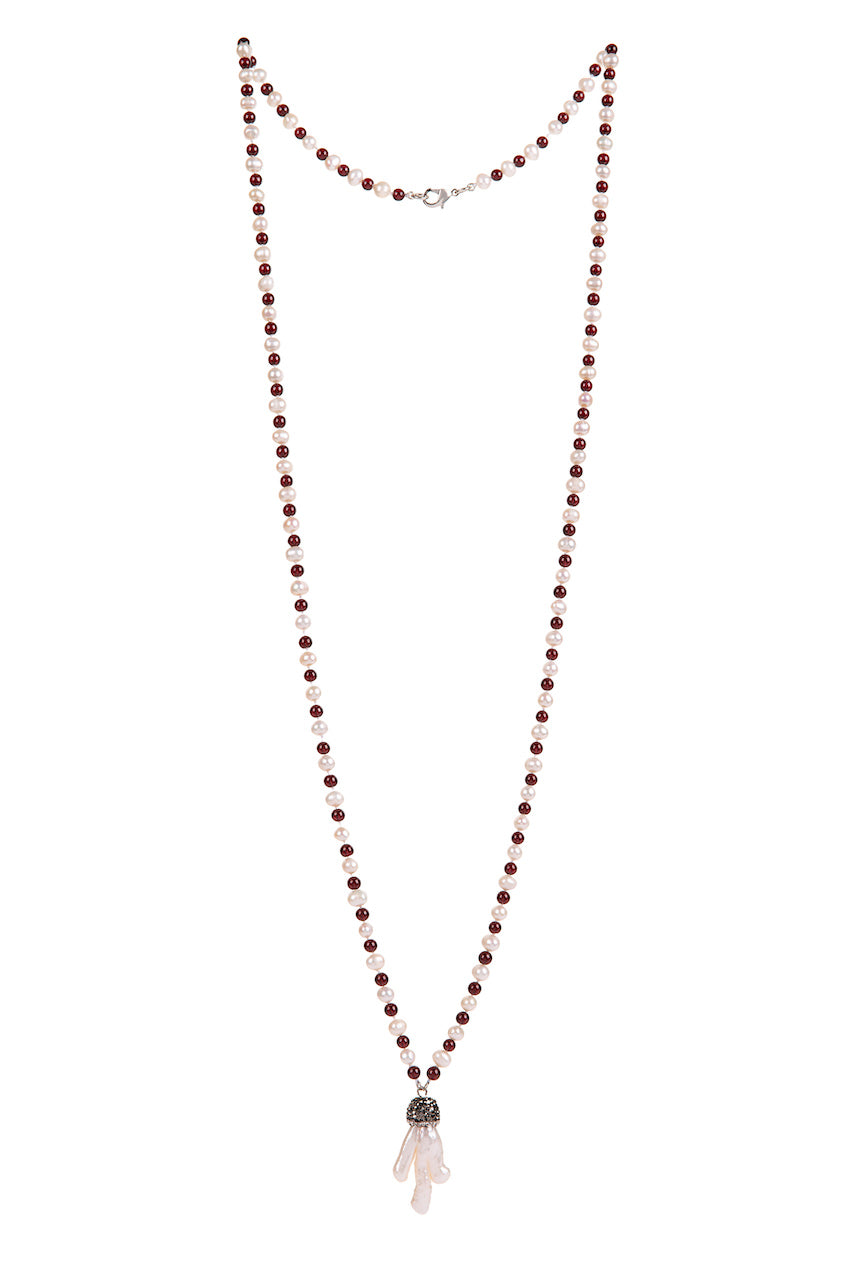 Dynamic combination of warm, passionate, deep red burgundy garnet round stones and freshwater pearls inspired the title: Deep Love. And as with love it can't be without that 'special touch'. In this case it is a charm made of brass and organic shape keishi pearl. You can wear it as a long single necklace, usual length double or choker style triple necklace.