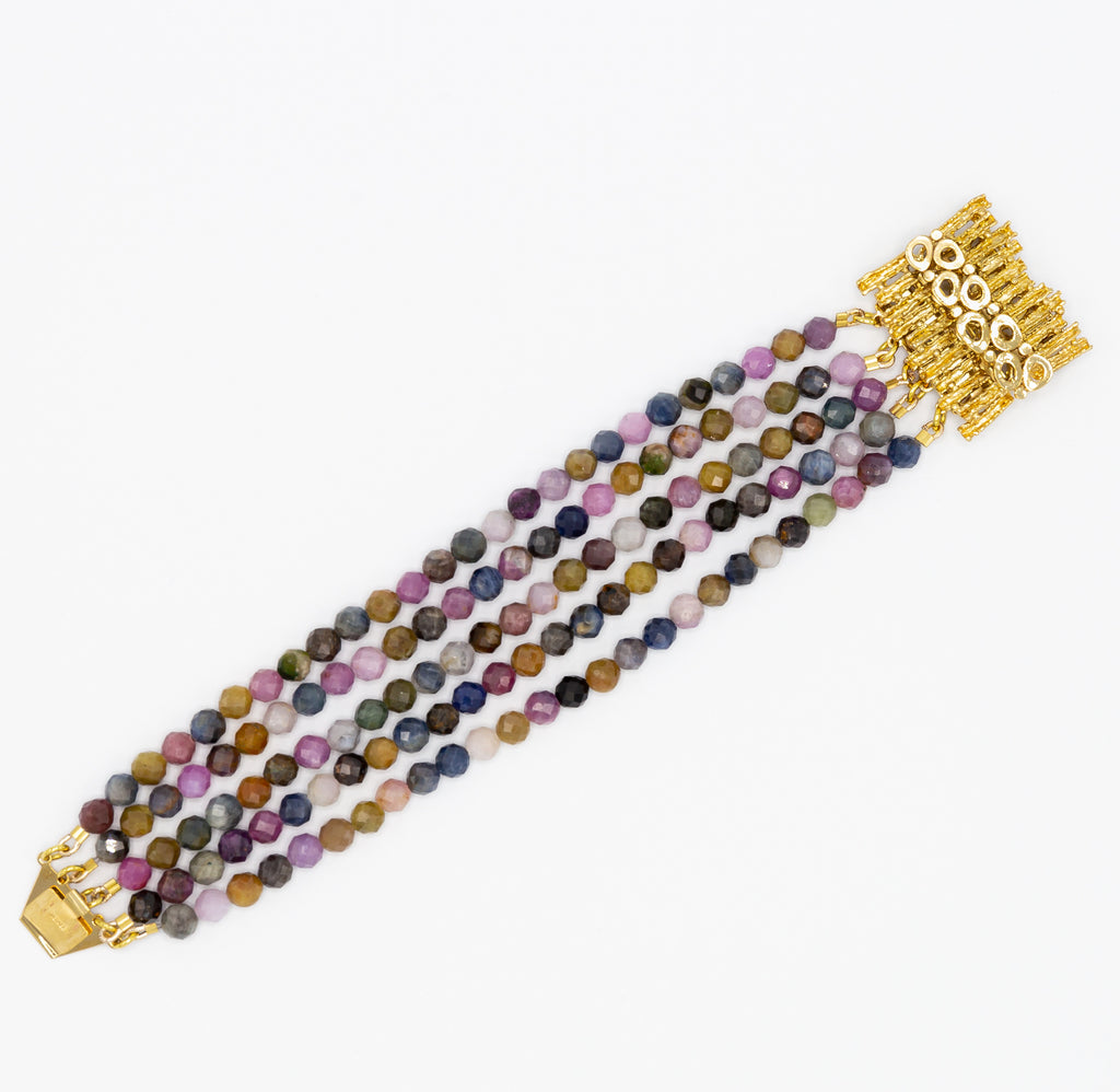 Make the perfect statement and say it with the colour with this beautiful raws of multicolour rubies finished with remarkable gold plated silver clasp