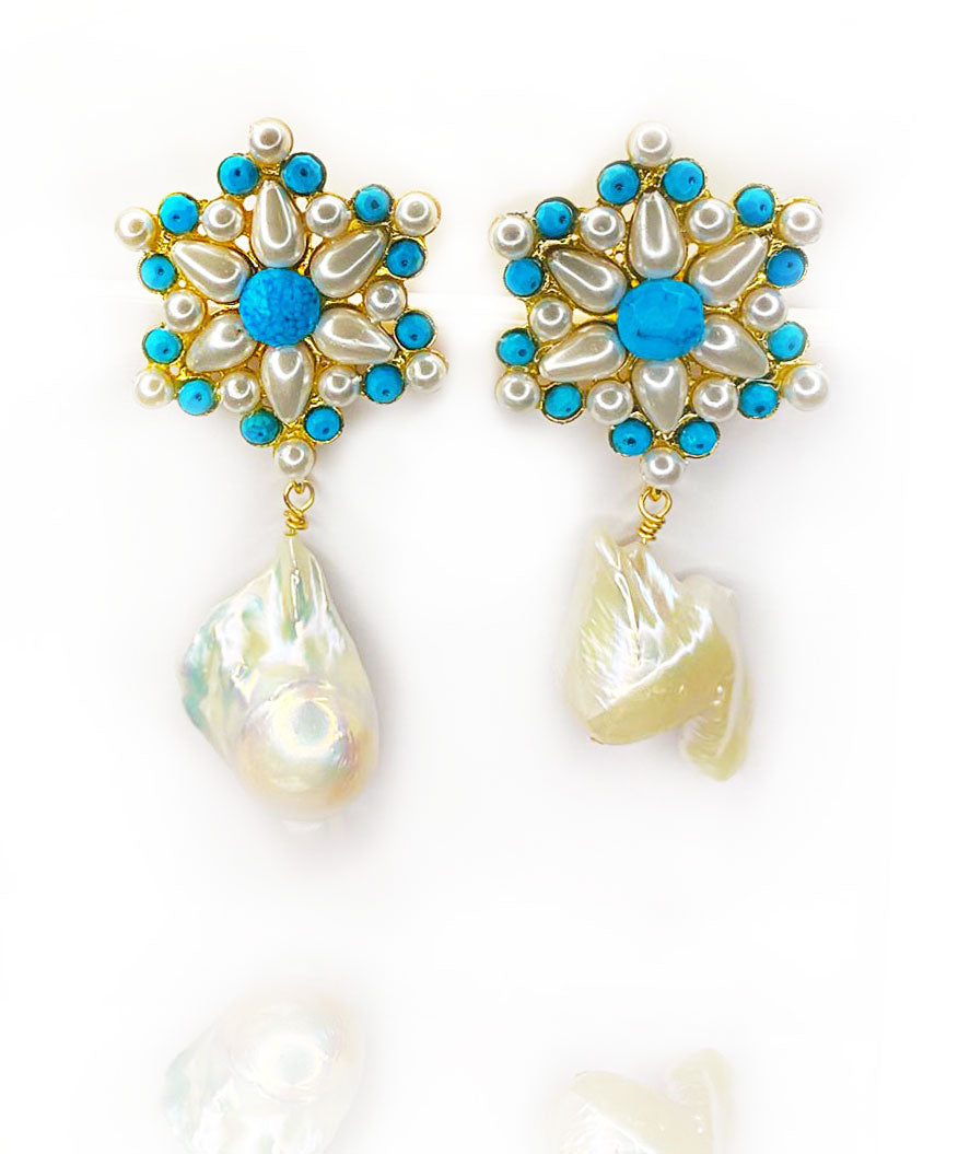 Turquoise and shell pearls star shape flower motive gives a whole new meaning to looking and feeling empowered.