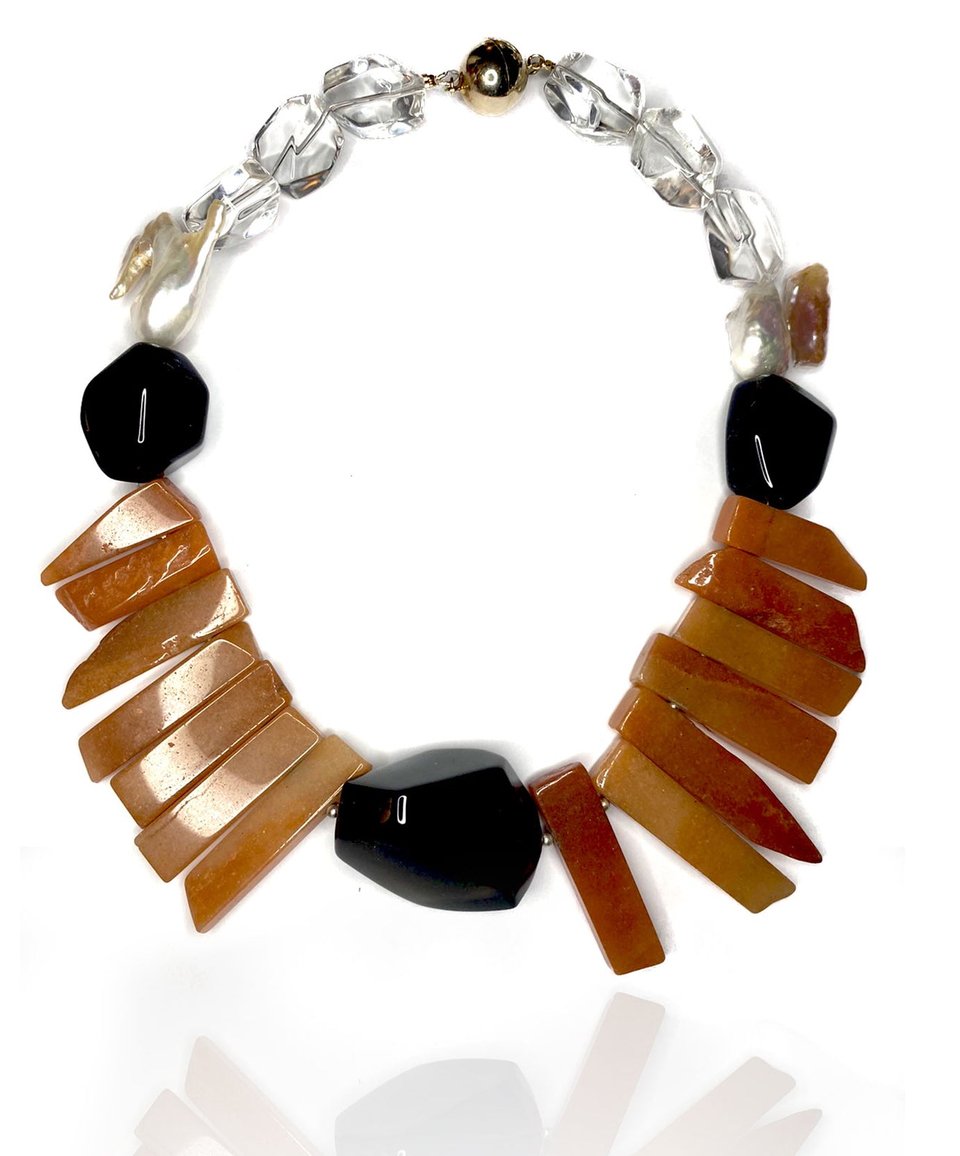 Enjoy the warmth of caramel agate with smokey brown and crystal quartz and two carefully selected keishi pearls. Gold plated sterling silver magnetic clasp. 